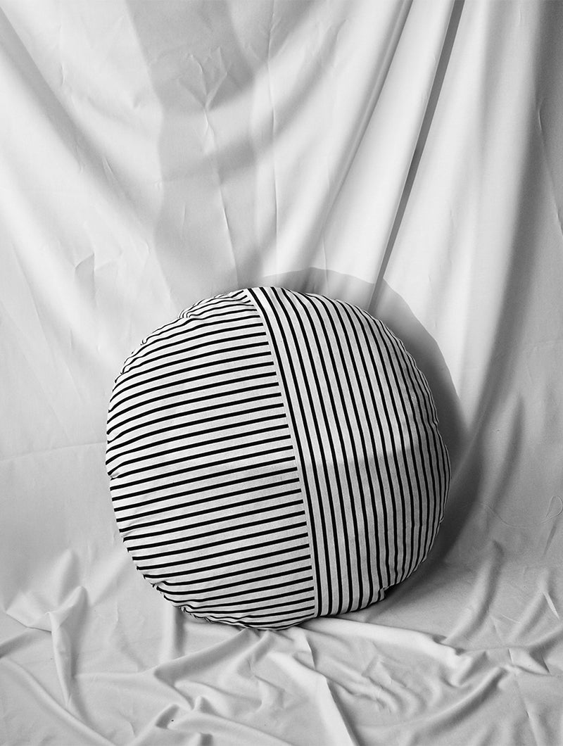 Round striped linen cushion